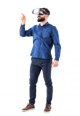 Young,Bearded,Business,Man,Wearing,Virtual,Reality,Using,Finger,On